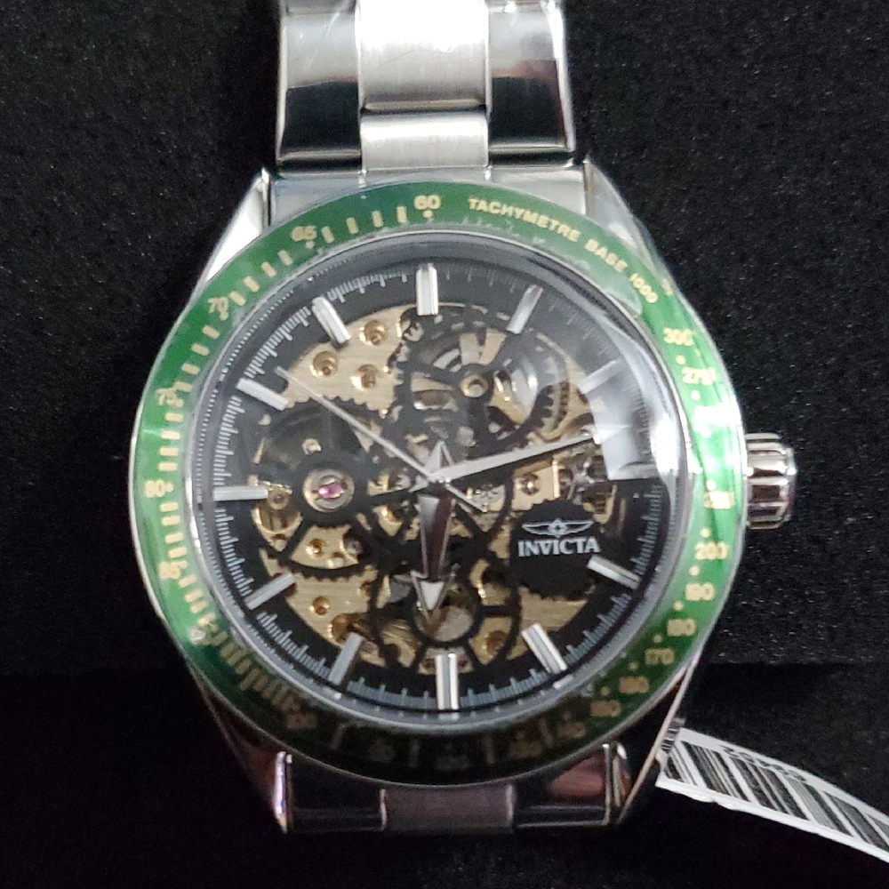 Invicta Silver Stainless Steel Skeleton Watch with Green Bezel